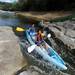 Ann Arbor residents Stephanie Huang, age 20, and her brother Daniel, age 18, take their kayak through the Argo Cascades in Ann Arbor in August. Angela J. Cesere | AnnArbor.com 